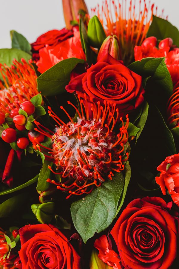 Rozenboeket met rood en groen